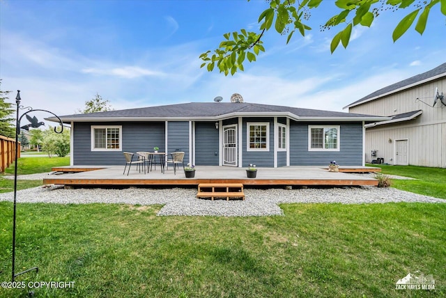 11510 Tulin Park Loop, Anchorage, AK 99516 - rear view of house with a lawn and a wooden deck