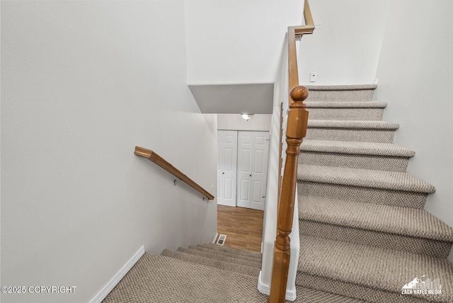 2578 Glacier St # 8, Anchorage, AK 99508 - stairs with carpet floors and wood finished floors