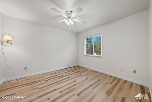 2578 Glacier St # 8, Anchorage, AK 99508 - empty room with light wood-style flooring and ceiling fan