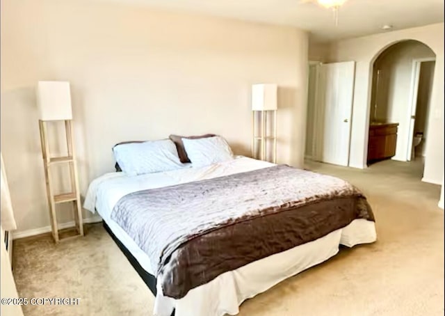 19440 Timberline Dr, Eagle River, AK 99577 - bedroom with light colored carpet and arched walkways