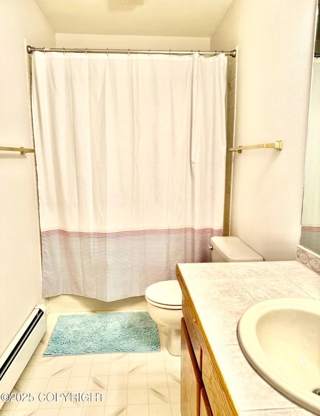 19440 Timberline Dr, Eagle River, AK 99577 - full bathroom with baseboard heating and vanity