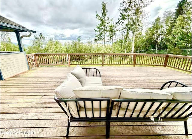 19440 Timberline Dr, Eagle River, AK 99577 - deck with outdoor lounge area and view of wooded area