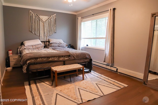 1468 Davison Rd, North Pole, AK 99705 - bedroom with baseboards, wood finished floors, a baseboard radiator, and crown molding