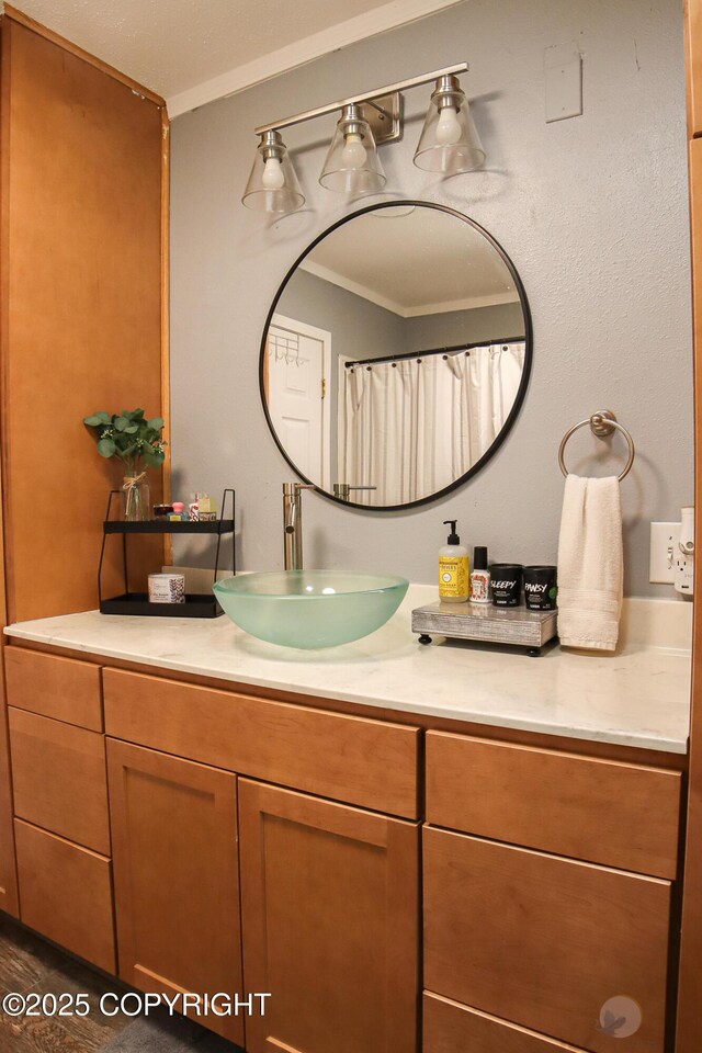 1468 Davison Rd, North Pole, AK 99705 - bathroom featuring ornamental molding and vanity