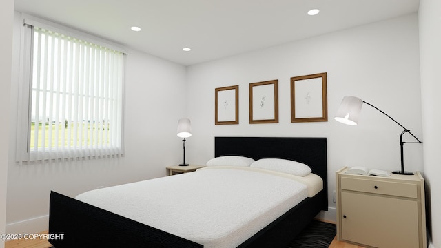 bedroom with recessed lighting, wood finished floors, baseboards, and multiple windows