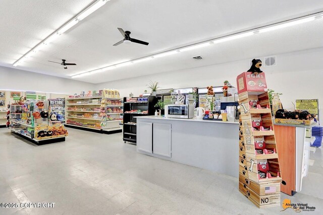 garage featuring ceiling fan and visible vents