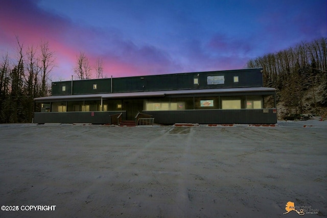 view of front of home with uncovered parking