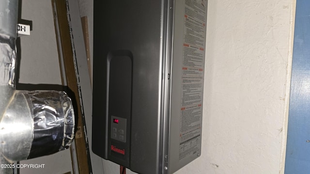 52899 Kingery Rd, Nikiski/North Kenai, AK 99611 - utility room featuring water heater