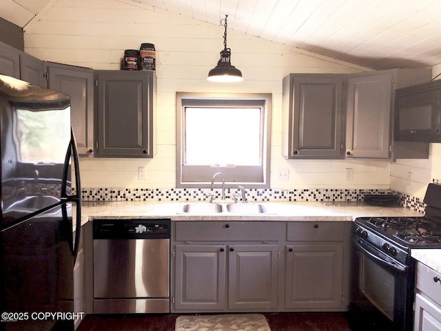 52899 Kingery Rd, Nikiski/North Kenai, AK 99611 - kitchen featuring gray cabinets, a sink, lofted ceiling, and black appliances