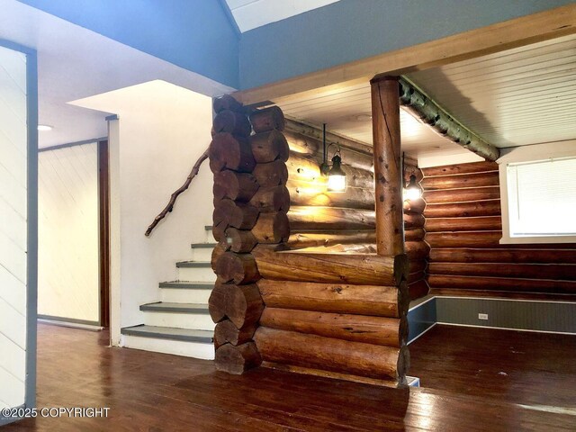 52899 Kingery Rd, Nikiski/North Kenai, AK 99611 - interior space featuring log walls, wood finished floors, and baseboards