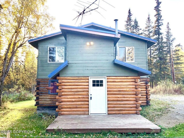 52899 Kingery Rd, Nikiski/North Kenai, AK 99611 - back of property with log exterior