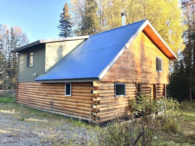 52899 Kingery Rd, Nikiski/North Kenai, AK 99611 - view of home's exterior featuring log exterior and metal roof
