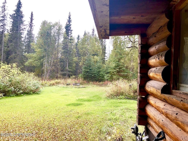 52899 Kingery Rd, Nikiski/North Kenai, AK 99611 - view of yard with a forest view