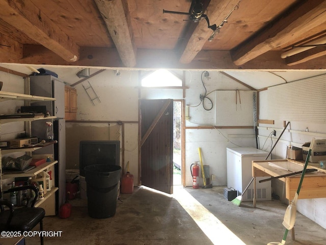 52899 Kingery Rd, Nikiski/North Kenai, AK 99611 - below grade area with ceiling fan and fridge