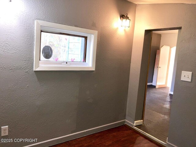 52899 Kingery Rd, Nikiski/North Kenai, AK 99611 - hall with a textured wall, baseboards, and wood finished floors