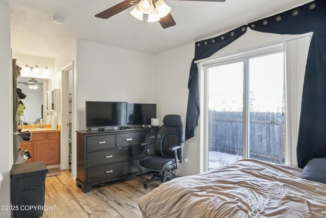 bedroom featuring a ceiling fan and light wood-style floors