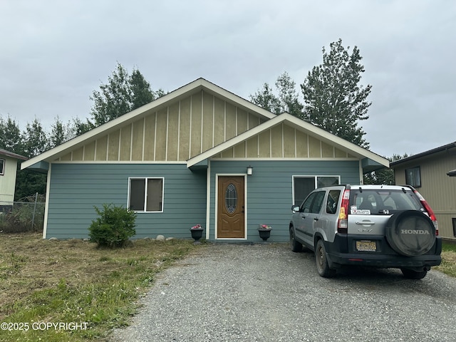 435 N Chugach St, Palmer, AK 99645 - view of front facade with board and batten siding and driveway