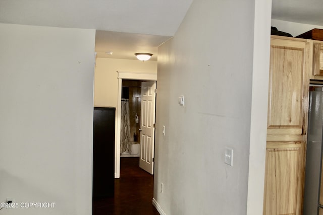 435 N Chugach St, Palmer, AK 99645 - hallway featuring dark wood-style flooring and baseboards