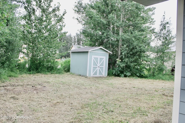 435 N Chugach St, Palmer, AK 99645 - view of yard with a storage shed
