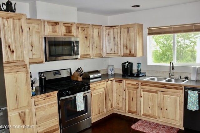 435 N Chugach St, Palmer, AK 99645 - kitchen featuring appliances with stainless steel finishes, light brown cabinets, and dark countertops