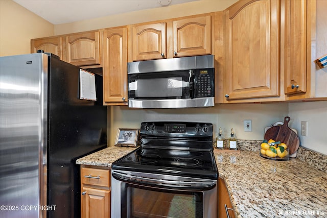 19111 Sarichef Loop, Eagle River, AK 99577 - kitchen with stainless steel appliances and light stone countertops