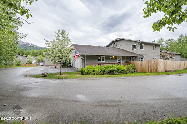 16627 River Heights Loop, Eagle River, AK 99577 - view of front of home featuring driveway and an attached garage