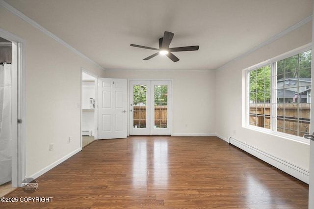 16627 River Heights Loop, Eagle River, AK 99577 - empty room with a baseboard heating unit, ceiling fan, plenty of natural light, crown molding, and wood finished floors