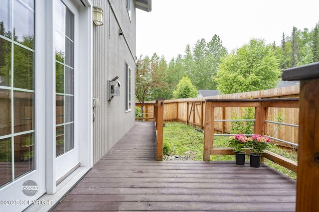 16627 River Heights Loop, Eagle River, AK 99577 - wooden terrace featuring a fenced backyard