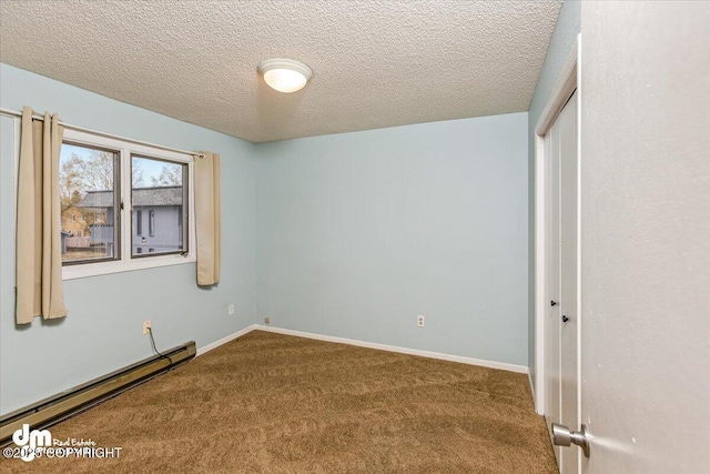 unfurnished bedroom featuring a textured ceiling, carpet floors, a baseboard radiator, baseboards, and a closet