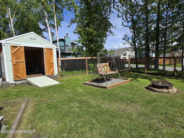 8041 Northwind Ave, Anchorage, AK 99504 - view of yard with an outdoor fire pit