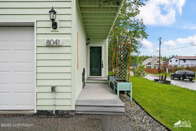 8041 Northwind Ave, Anchorage, AK 99504 - property entrance featuring a lawn