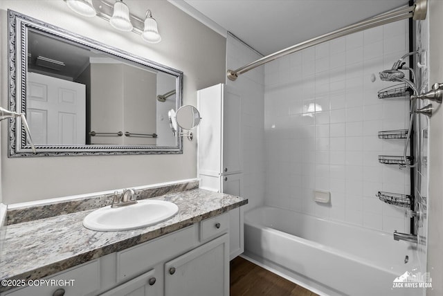 8041 Northwind Ave, Anchorage, AK 99504 - bathroom featuring bathing tub / shower combination, vanity, and wood finished floors