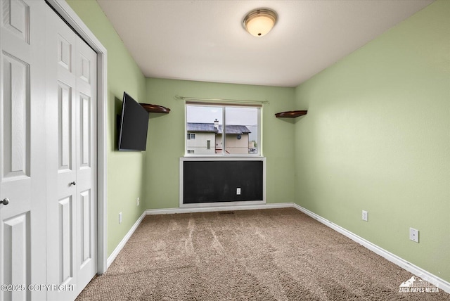 8041 Northwind Ave, Anchorage, AK 99504 - carpeted empty room featuring baseboards