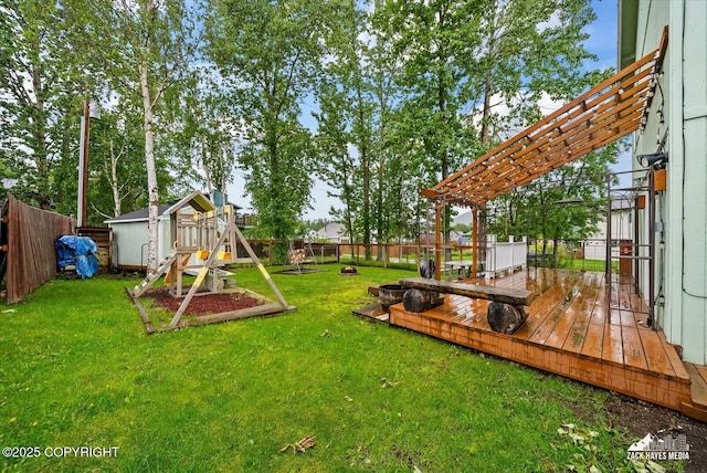 8041 Northwind Ave, Anchorage, AK 99504 - view of yard with a playground and a wooden deck