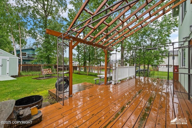 8041 Northwind Ave, Anchorage, AK 99504 - wooden deck with a fire pit