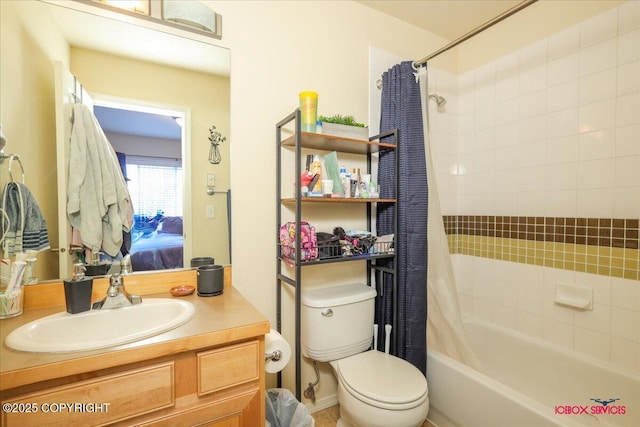bathroom with toilet, vanity, and shower / tub combo with curtain