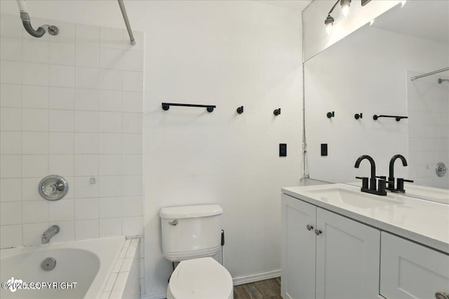 2308 Casey Cusack Loop, Anchorage, AK 99515 - bathroom featuring vanity, toilet, and bathing tub / shower combination