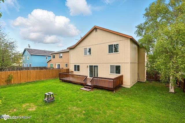 2308 Casey Cusack Loop, Anchorage, AK 99515 - back of house with a deck and a fire pit