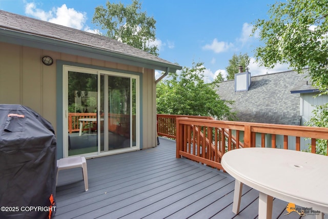 wooden terrace with grilling area
