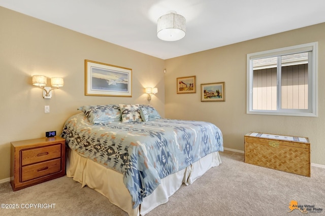 bedroom featuring carpet floors and baseboards