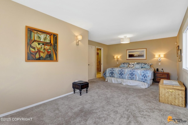 bedroom with carpet floors and baseboards