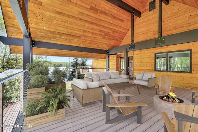 6517 S Becky Ln, Wasilla, AK 99652 - deck featuring an outdoor living space with a fire pit
