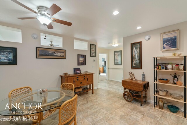 dining area with baseboards, ceiling fan, and recessed lighting