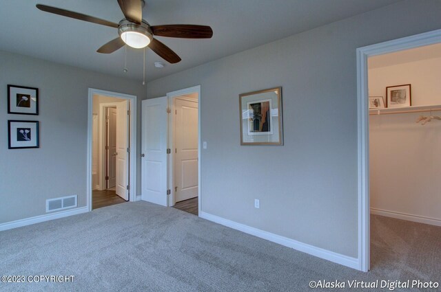 300 Shageluk St, Anchorage, AK 99504 - unfurnished bedroom with baseboards, visible vents, carpet, and a spacious closet