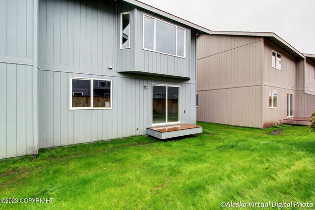 300 Shageluk St, Anchorage, AK 99504 - back of property with a lawn
