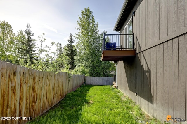 648 E 73rd Ave # 2, Anchorage, AK 99518 - view of yard featuring a balcony