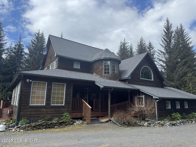 32945 Melanie Ln, Seward, AK 99664 - view of front of home featuring covered porch and roof with shingles