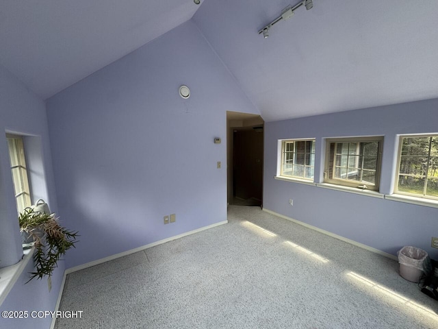 32945 Melanie Ln, Seward, AK 99664 - carpeted spare room featuring lofted ceiling and baseboards