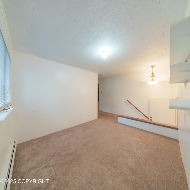 7621 E 4th Ave, Anchorage, AK 99504 - spare room featuring light colored carpet and a baseboard radiator
