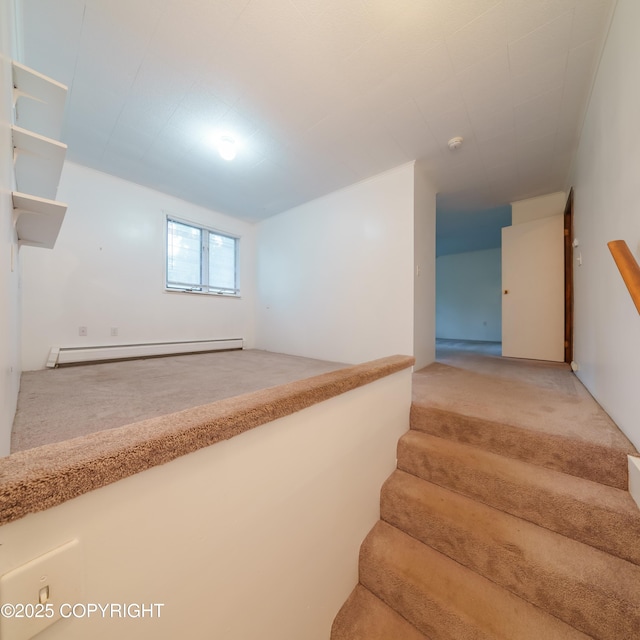 7621 E 4th Ave, Anchorage, AK 99504 - stairs with carpet floors and a baseboard heating unit
